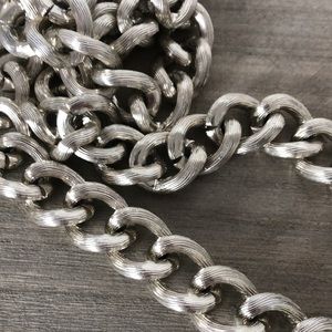 Large long chain linked silver toned necklace